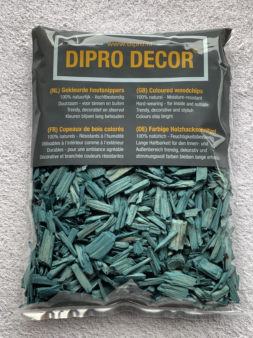 https://www.warentuin.nl/media/catalog/product/1/7/1778716288000855_dipro_decor_houtsnippers_houtsnippers_1_l_turquoise_dipro_deco_bec2.JPG